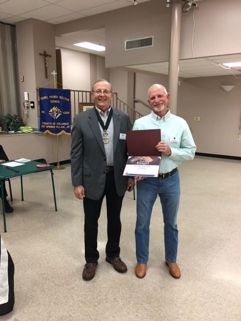 Grand Knight Murray Claassen presenting Jim Bergstrom with the Knight of the Month Award
