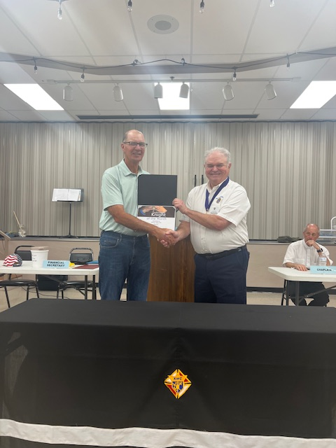 Mark Lukasavige May 2025 Knight of the Month receiving his Award from DKN Randy Schnobelen