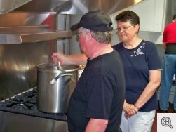 Rick Hiemenz and Rosemary Rogers in Saint Francis kitchen.  