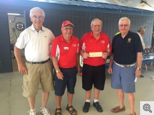 Presenting the Knights of Columbus donation to their scholarship fund were (left to right) Milt Spaniel, Jack Barry, Bill Veal and Walter Free. 