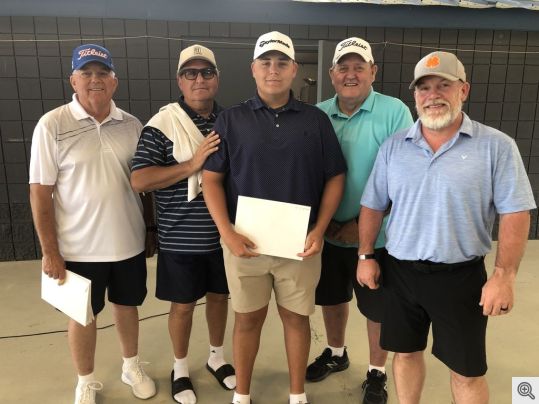 Pictured above with Scott Krantz the First Place Winners of Flight one from Right to Left are Tony Melugin, Ron Graves, Ryan Camras and Rob Camras.