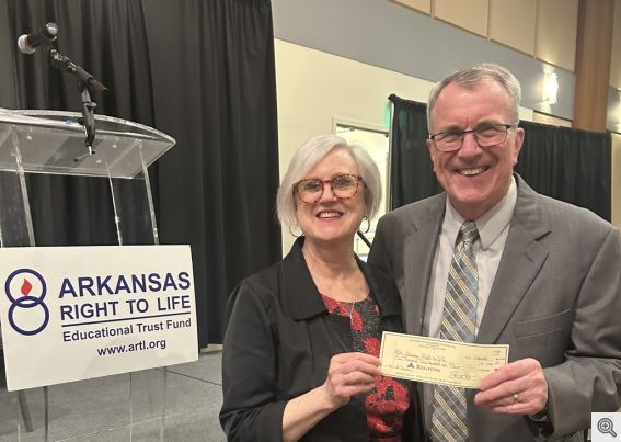 Bob Bowman presents check to Rose Mimms, Arkansas Right to Life