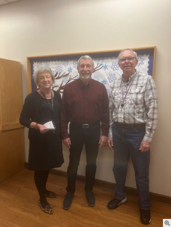 Gary Wolfer Presents a $3096.00 check to Nina Alter, Director of The Caring Place Adult Care Program