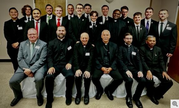 Front Row: Dc. Ashburn, Fr. Hebert, Fr. Bill, Bishop Taylor, Father de Orbegozo and Fr. Ravi  Back Row: Fifteen Seminarians