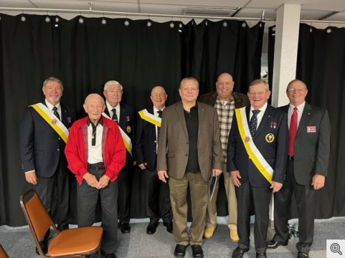 Pictured from left to right: GK Gary Wolfer; Brother Knight Joseph Radzikowski; Brother Knight Tom Donnelly; Brother Knight Gerald Krawczynski; Brother Knight Todd Norlin; Brother Knight Troy VreNon; Brother Knight Bill Patterson; Districk 10 Deputy Murray Claassan