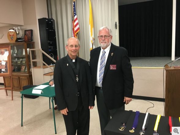 Fr. Bill receives Chaplain metal